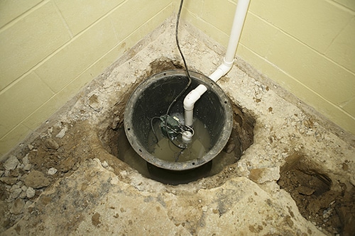A sump pump in need of maintenance
