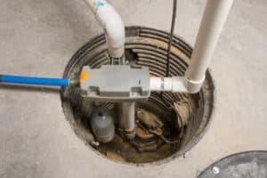 A sump pump installed in a basement of a home.