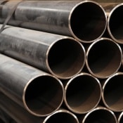 Pipes stacked on top of each other in a pile